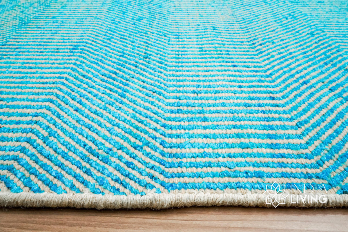 Aqua blue flatweave rug corner detail