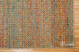 Top-down view of multi blend diamond geometric rug