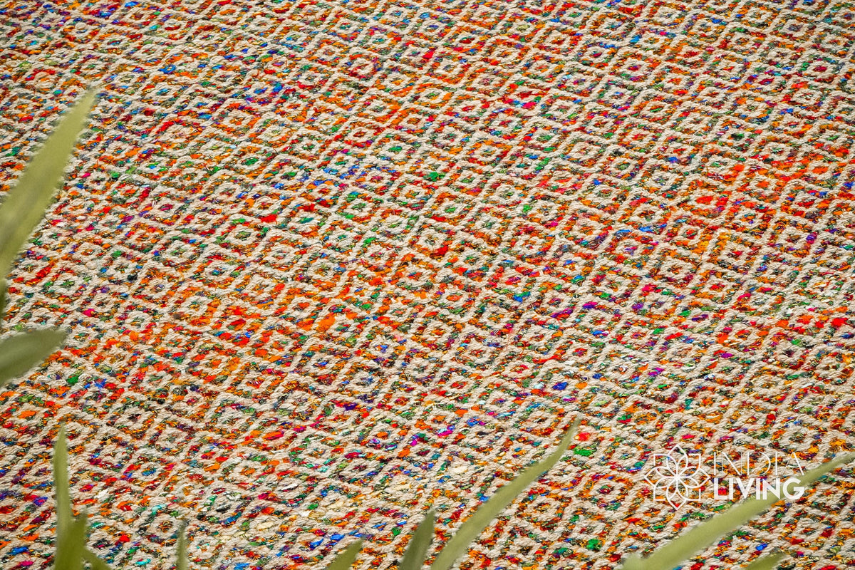 Multi blend diamond wool rug styled in a living room