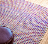 Purple flatweave rug corner detail