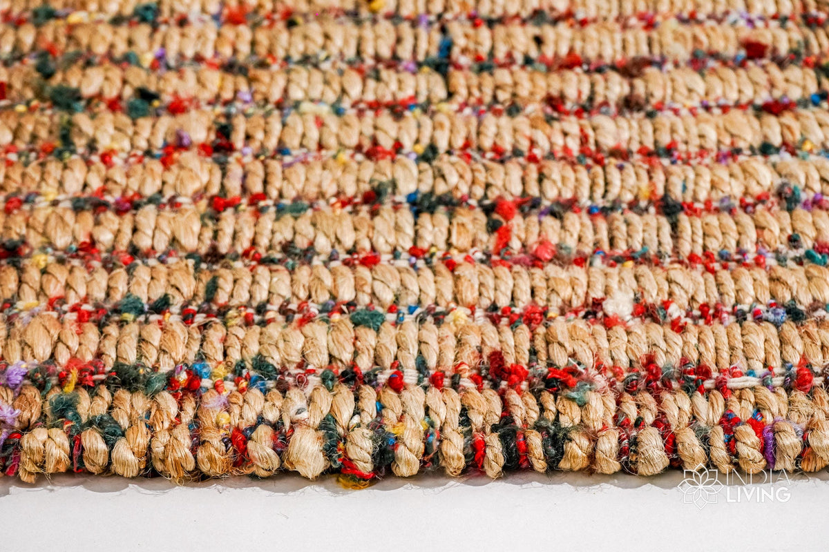 Top-down view of natural multicolour ribbed jute rug