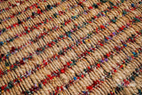 Natural jute rug under a coffee table