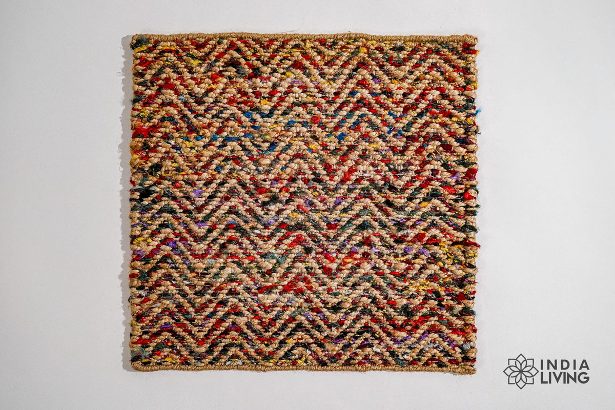 Natural jute chevron rug in a bright entryway setting