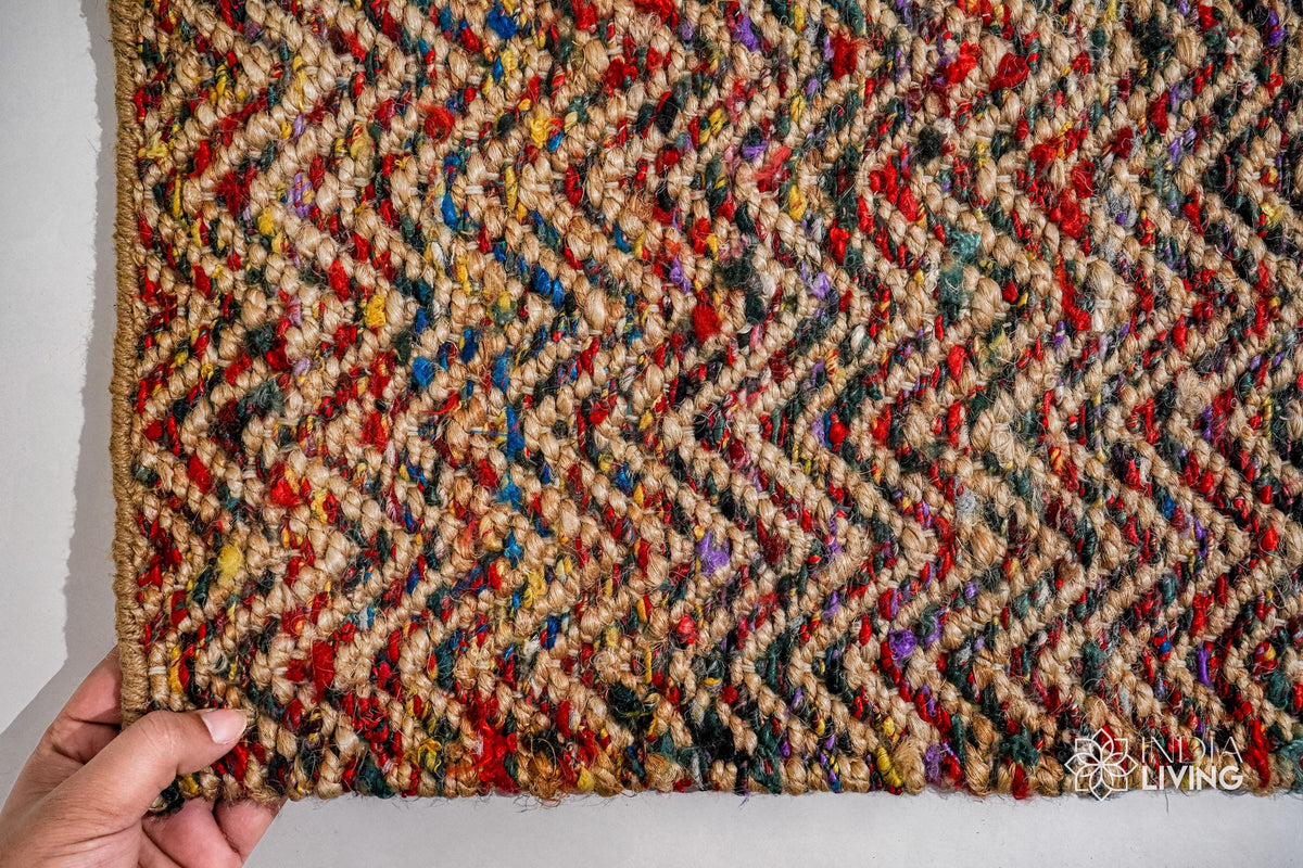 Natural jute chevron rug styled in a living room