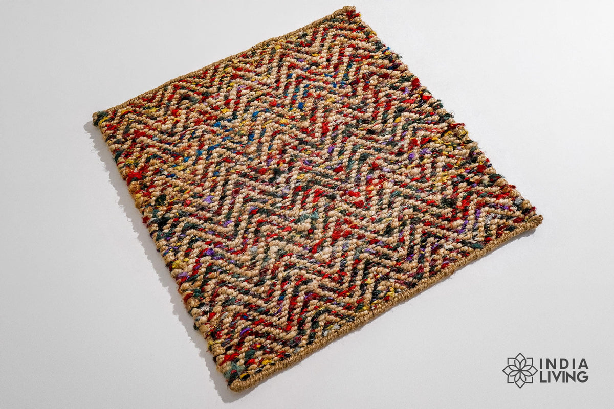 Natural jute chevron rug under a coffee table