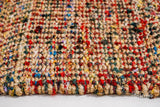 Multicolour jute chevron striped rug corner detail