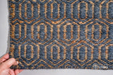 Diamond flatweave rug in a hallway entryway