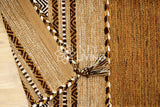 Brown kilim rug in a dining room setting