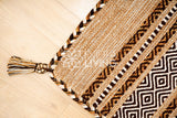 Kilim rug shown with matching cushions