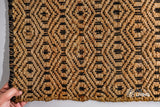 Jute diamond weave rug in a hallway entryway