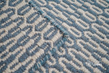 Bluish grey geometric flatweave wool rug, flat lay view