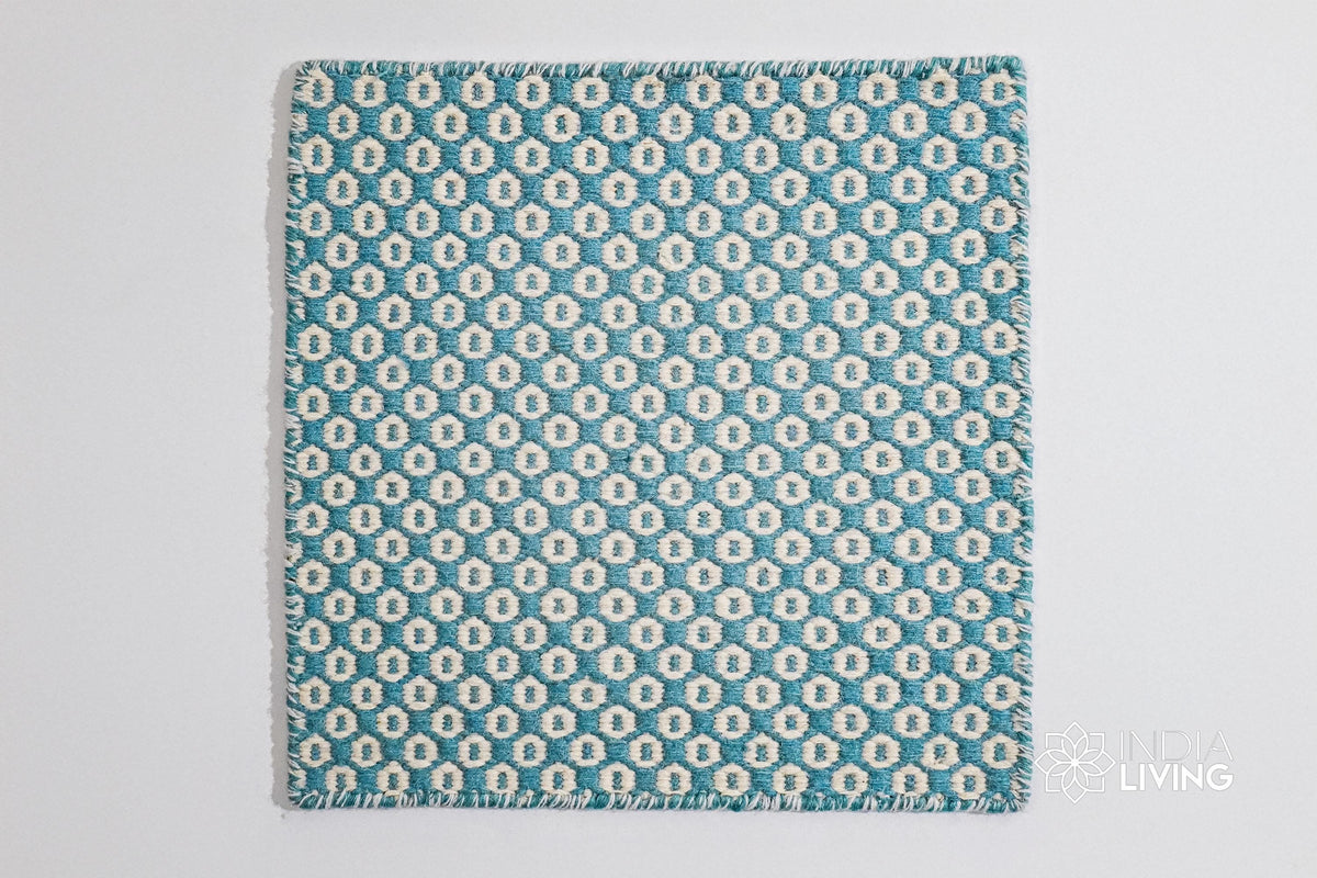 Turquoise blue flatweave rug corner detail