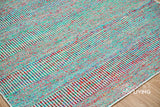 Multi blend teal wool rug full room lifestyle shot