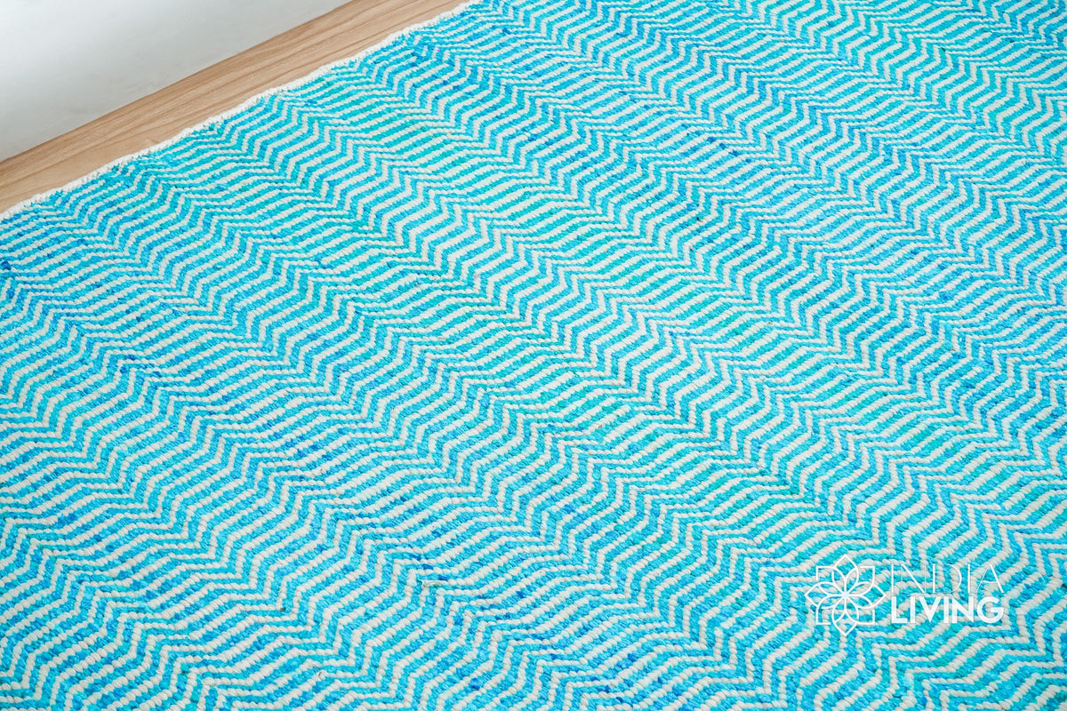 Close-up of aqua blue chevron weave wool texture