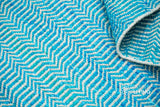 Aqua blue flatweave rug corner detail