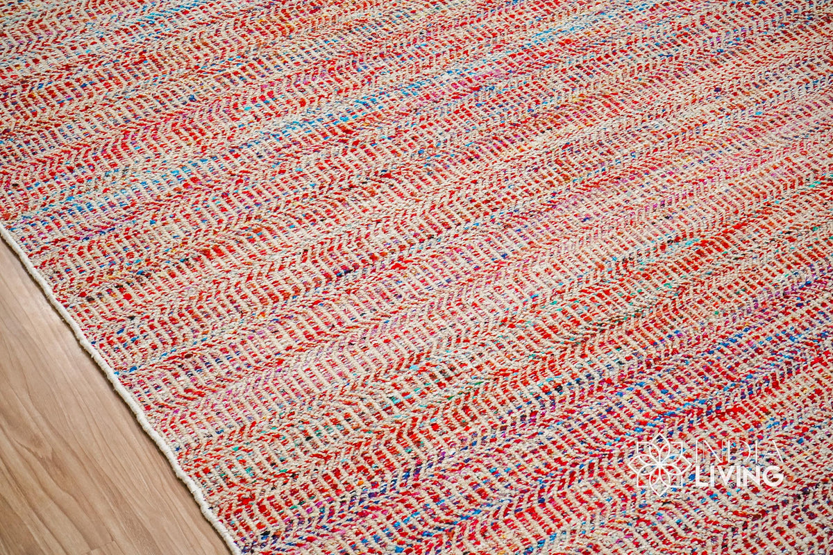 Multi blend red flatweave rug corner detail