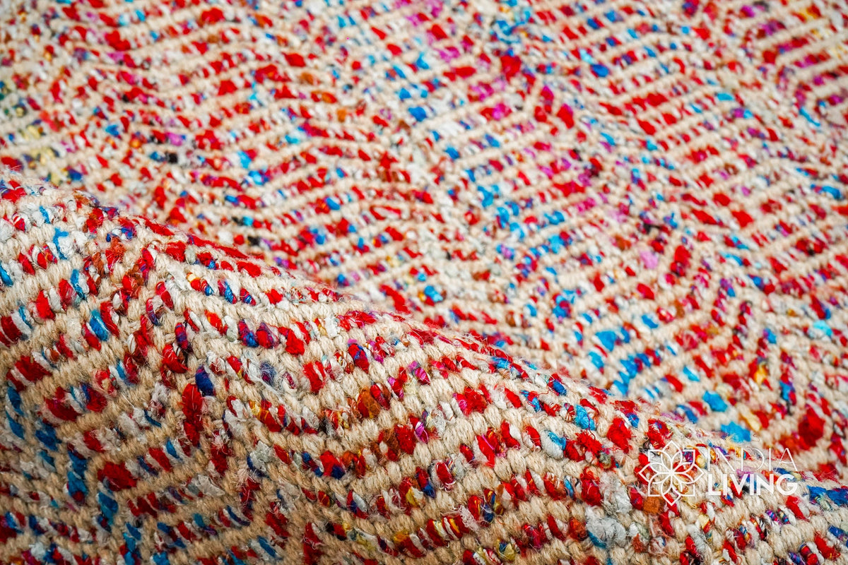 Multi blend red wool rug texture close-up showing handwoven weave