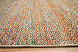 Multi blend diamond wool rug under a coffee table