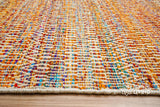 Multi blend orange wool rug texture close-up showing handwoven weave