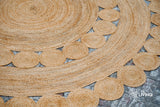 Round jute rug in a natural, sustainable home decor setting