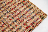 Natural multicolour ribbed jute rug, flat lay view