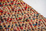 Multicolour jute diamond rug corner detail