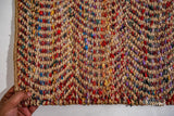 Multicolour jute ripple rug corner detail