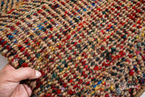 Natural jute chevron striped rug styled in a living room