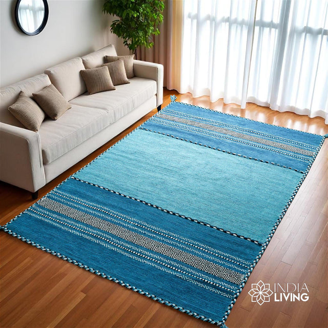 Teal blue diamond-pattern kilim rug, full flat view