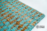 Turquoise blue abstract geometric handwoven rug, full flat view