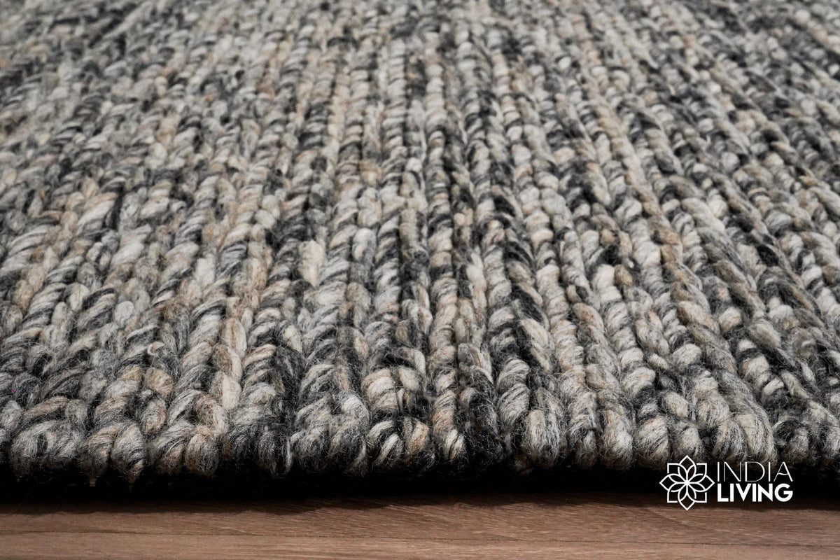Chunky cable knit rug in a Scandinavian living space