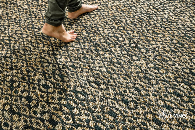 Jute diamond twill rug styled in a living room