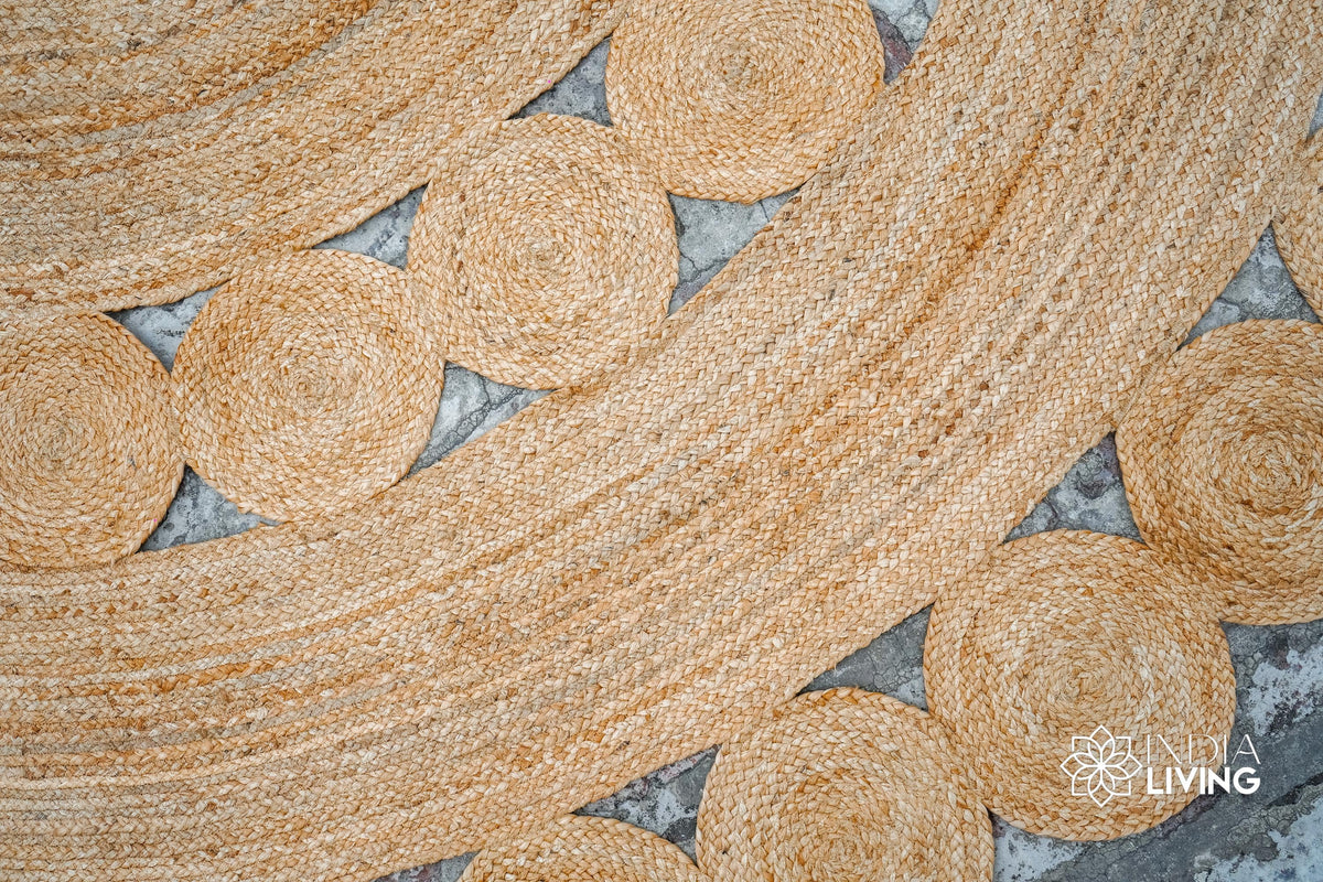 Round jute rug placed in an entryway