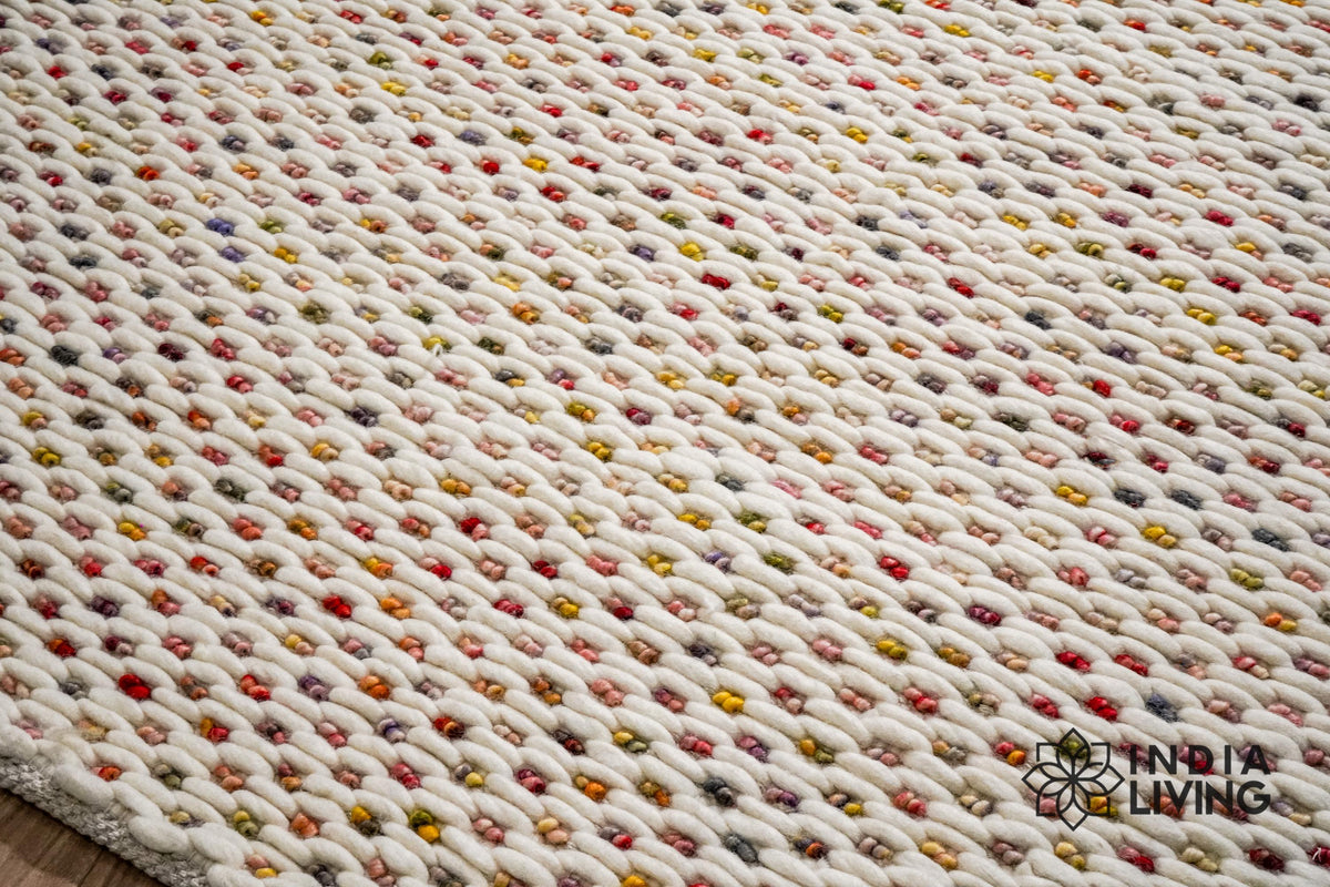 Ivory wool rug colour fleck close-up