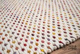 Close-up of colourful chunky wool loop texture