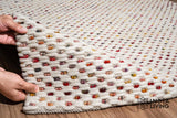 Multi colour wool rug in a kids room setting