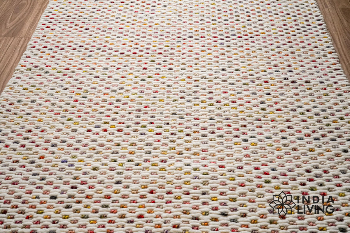 Ivory wool rug corner and edge detail
