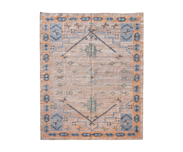 Moroccan lattice jute rug styled in a boho living room