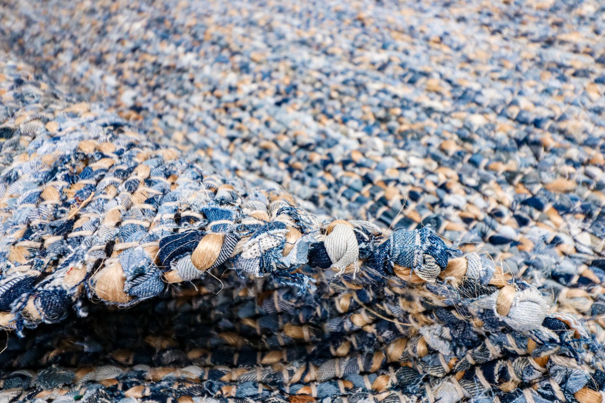 Handwoven denim rag rug in a modern boho living space
