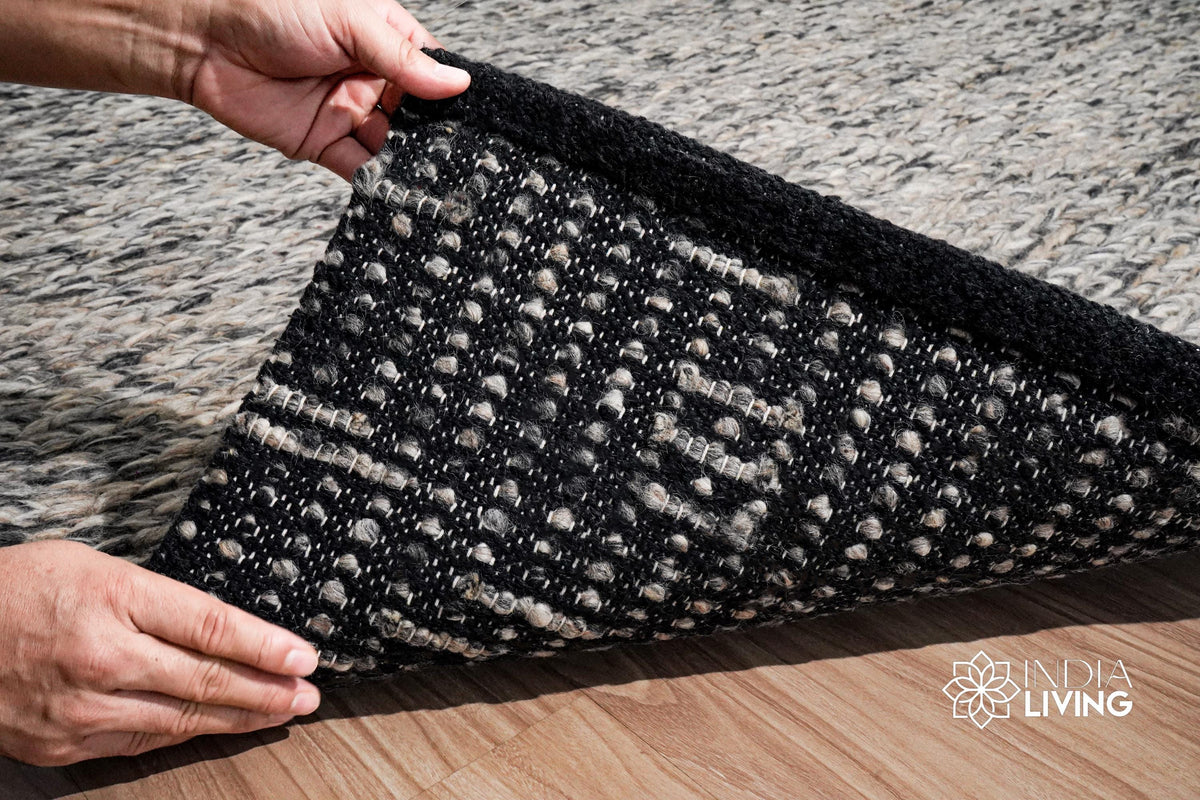 Grey cable knit chunky wool rug full room lifestyle view