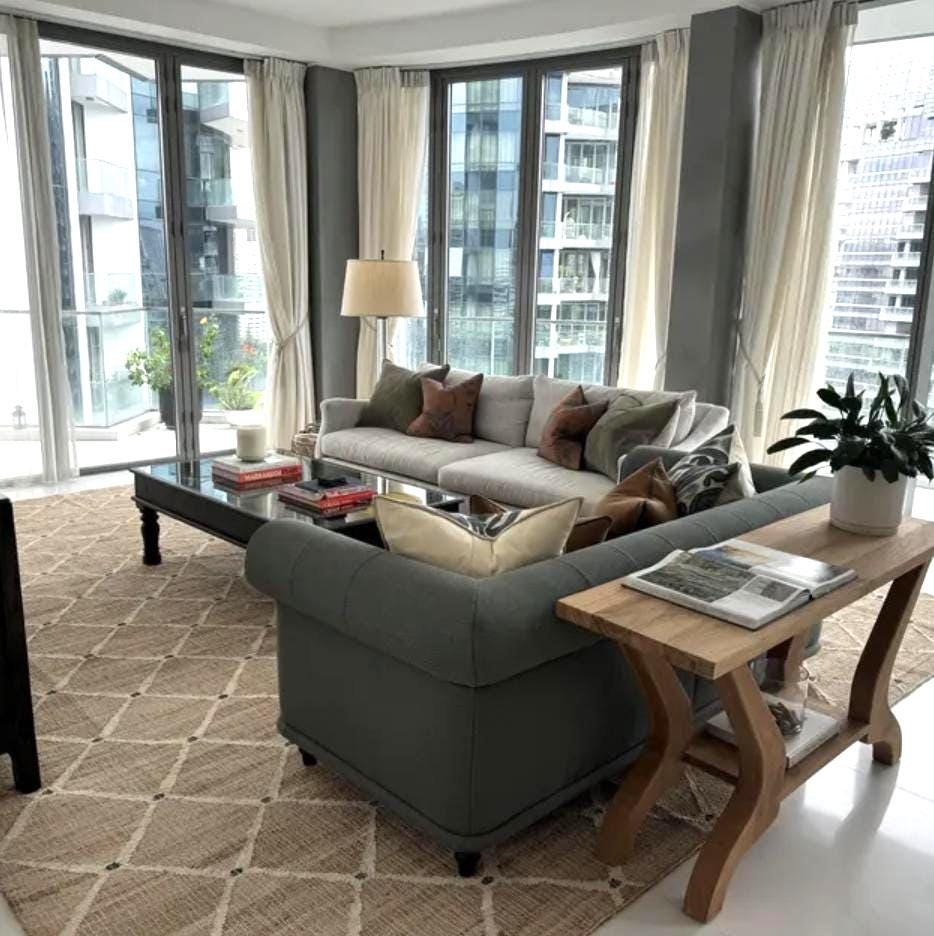 Ivory geometric jute rug styled in a living room