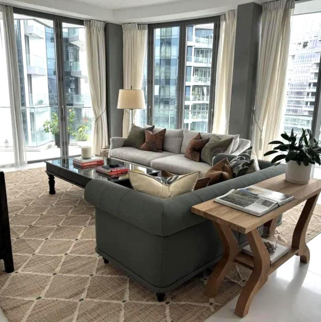Ivory geometric jute rug styled in a living room