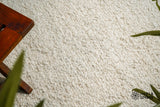 Close-up of chunky ivory wool texture