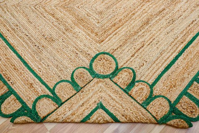 Green scallop jute runner styled in a hallway