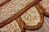 Brown scalloped jute rug texture detail shot