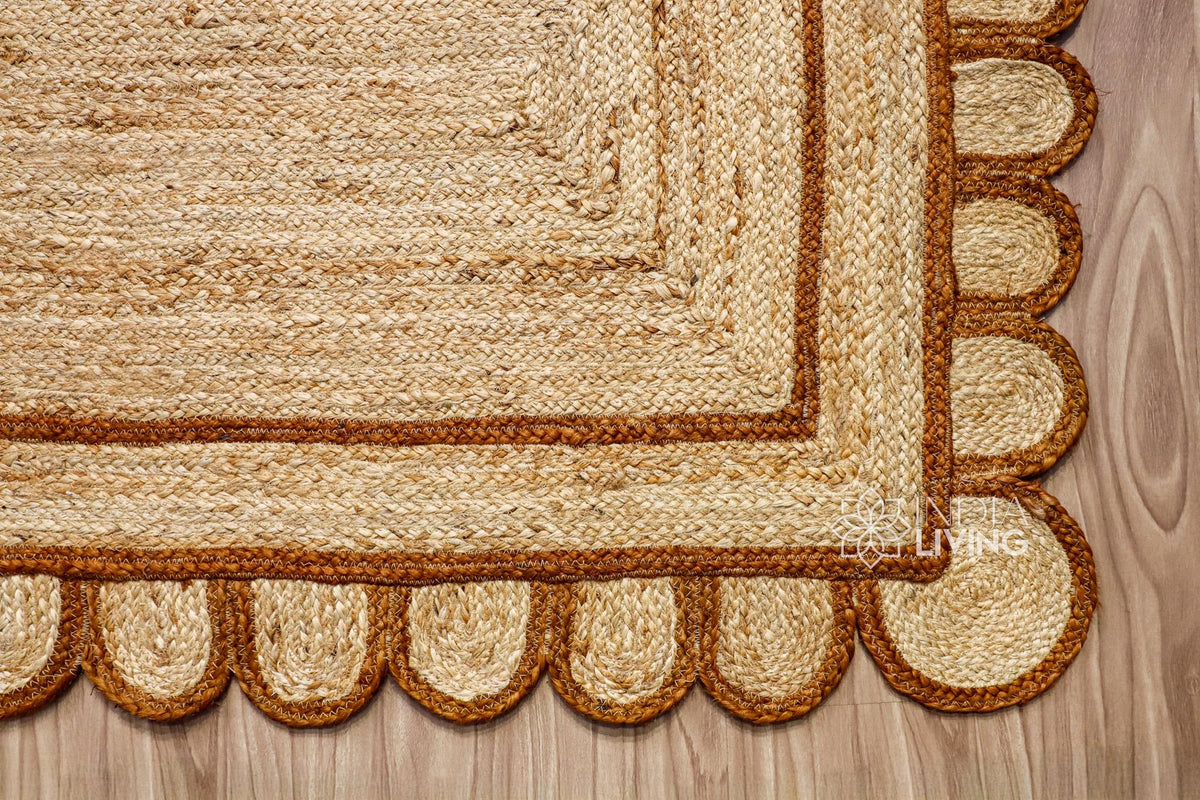 Hand braided brown rug shown in an entryway setting