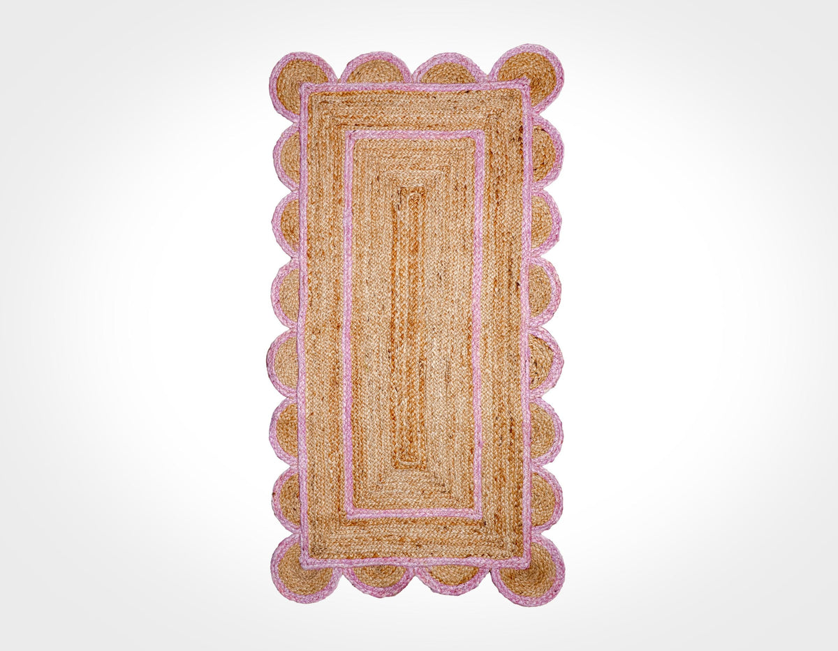 Light pink jute runner styled in a hallway setting