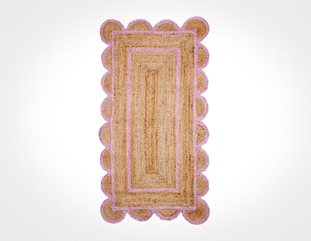 Light pink jute runner styled in a hallway setting