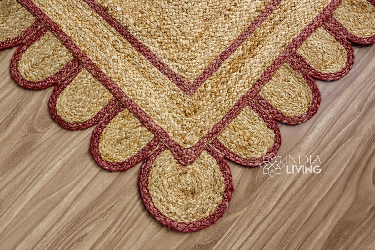 Overhead view of burgundy jute runner on wood flooring