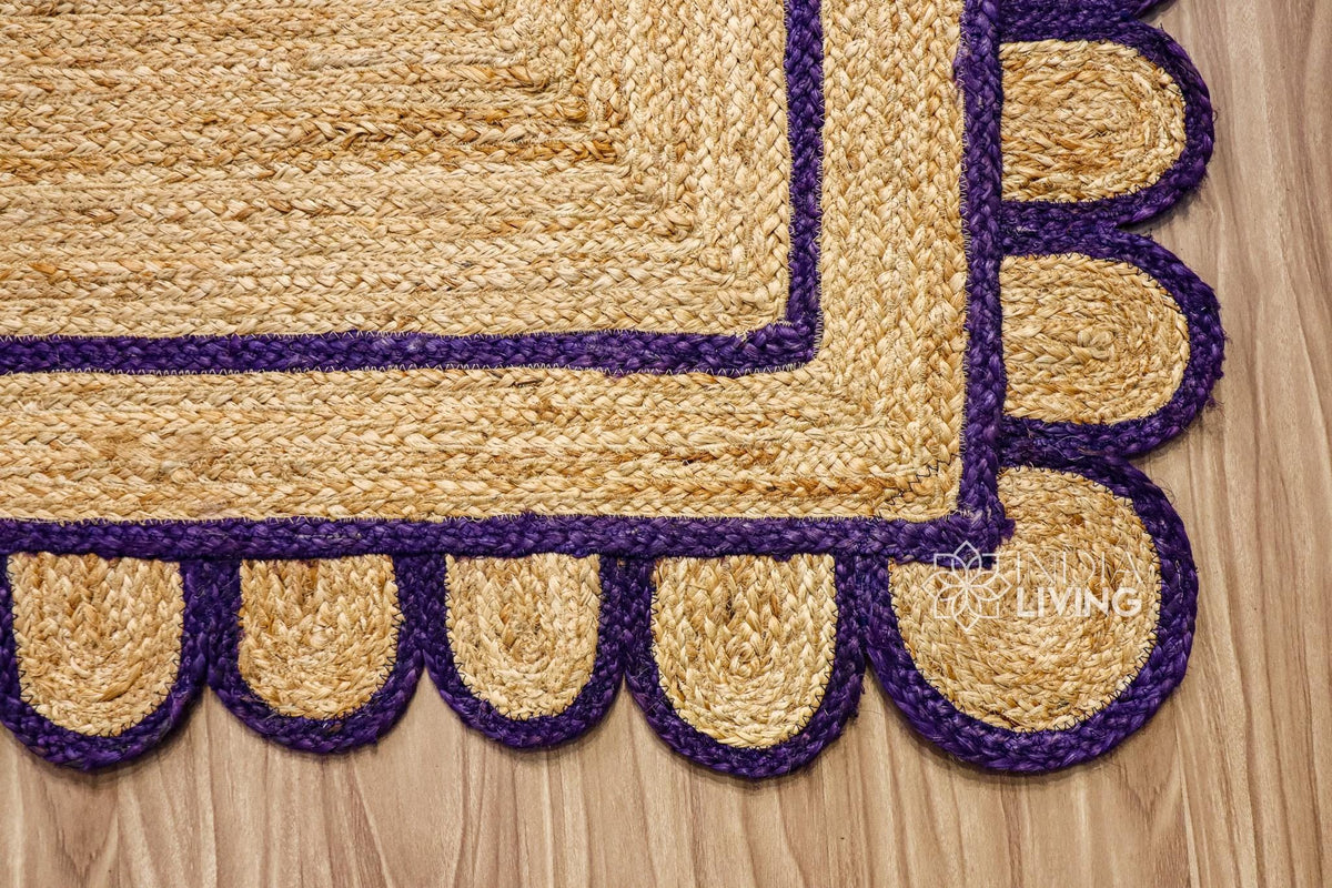 Overhead view of purple jute runner on wood flooring